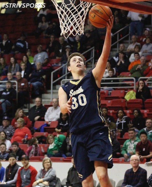 Elkhorn South senior guard Johnny Trueblood glides to the rim for a layup. Trueblood broke the Elkhorn South and Heartland Hoops Classic scoring record with 42 points.