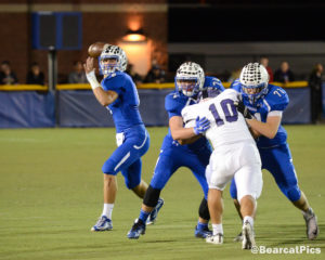 Kearney quarterback Kanon Koster fires a pass (or runs the ball) in the Bearcats win 17-0 over Grand Island on Friday. Koster finished 7-for-17 for 111 yards passing and also added 18 carries for 78 yards. Photo Courtesy of @BearcatPics.